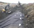 Excavation and geotextile installation